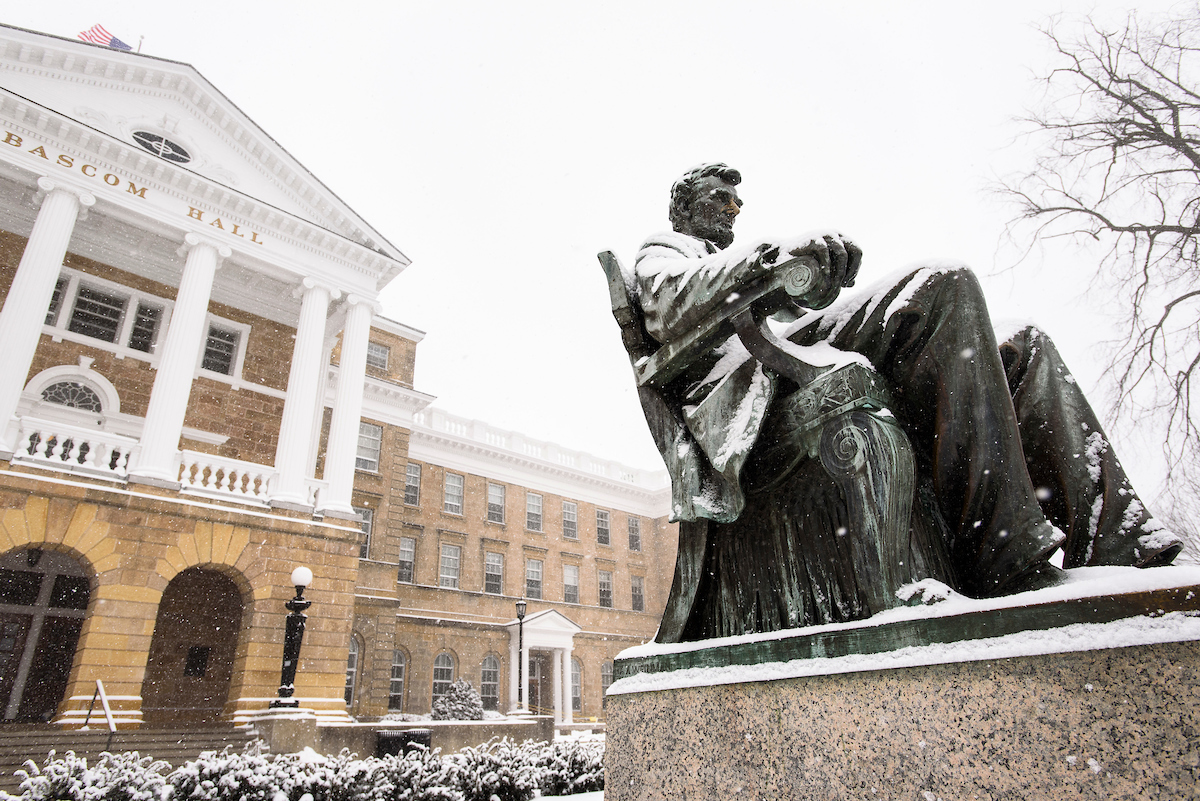 Lincoln statue in front of Bascom Hall covered in snow.